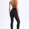 Salopeta Kiki din modal, cu decolteu adânc și spate decupat, în negru Salopeta Kiki din modal, cu decolteu adânc și spate decupat, în negru
