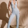 Salopeta Ramona Petite cu decolteu adânc și ornamente, în culoarea Aqua Salopeta Ramona Petite cu decolteu adânc și ornamente, în culoarea Aqua