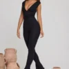 Salopeta Romana cu decolteu adânc și talie drapată, în culoarea negru Salopeta Romana cu decolteu adânc și talie drapată, în culoarea negru