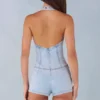 Salopeta scurta Lalita cu guler halter și nasturi, din denim deschis Salopeta scurta Lalita cu guler halter și nasturi, din denim deschis
