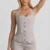 Salopeta scurta Lalita cu guler halter și nasturi, în culoarea ecru Salopeta scurta Lalita cu guler halter și nasturi, în culoarea ecru