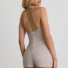 Salopeta scurta Lalita cu guler halter și nasturi, în culoarea ecru Salopeta scurta Lalita cu guler halter și nasturi, în culoarea ecru