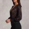Salopeta Serenya din dantelă transparentă, cu decolteu adânc și croială lejeră, în culoarea neagră Salopeta Serenya din dantelă transparentă, cu decolteu adânc și croială lejeră, în culoarea neagră