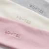 Set de 3 bentițe Soft Active în culori asortate Set de 3 bentițe Soft Active în culori asortate