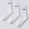 Set de trei perechi de șosete cu guler semi-curt, cu nervuri, de culoare albă Set de trei perechi de șosete cu guler semi-curt, cu nervuri, de culoare albă