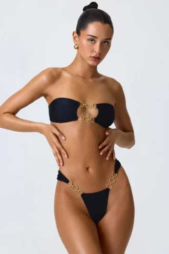 Top de bikini bandeau cu decupaje și ornamente Sunny Isles, negru