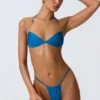 Top de bikini cu decolteu halter, cu volane și ornamente, model Clearwater, în albastru ocean Top de bikini cu decolteu halter, cu volane și ornamente, model Clearwater, în albastru ocean