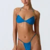 Top de bikini cu decolteu halter, cu volane și ornamente, model Clearwater, în albastru ocean Top de bikini cu decolteu halter, cu volane și ornamente, model Clearwater, în albastru ocean