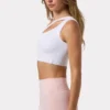 Sutien sport asimetric fără cusături, cu nervuri moi, în culoarea alb Sutien sport asimetric fără cusături, cu nervuri moi, în culoarea alb