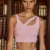 Sutien sport asimetric fără cusături, cu nervuri moi, în nuanța Powder Pink Sutien sport asimetric fără cusături, cu nervuri moi, în nuanța Powder Pink
