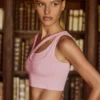 Sutien sport asimetric fără cusături, cu nervuri moi, în nuanța Powder Pink Sutien sport asimetric fără cusături, cu nervuri moi, în nuanța Powder Pink
