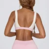 Sutien sport contrastant în marl roz pal Sutien sport contrastant în marl roz pal