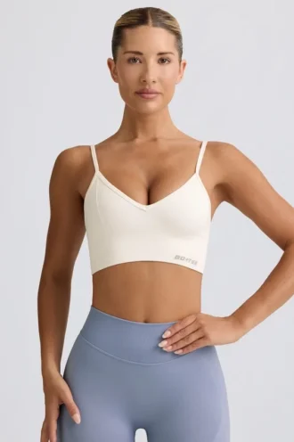 Sutien sport Define Luxe cu decolteu în V, alb