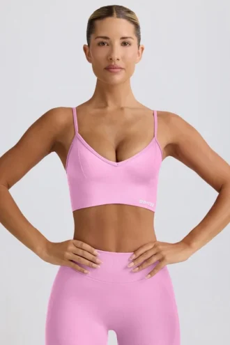 Sutien sport Define Luxe cu decolteu în V, roz bubblegum