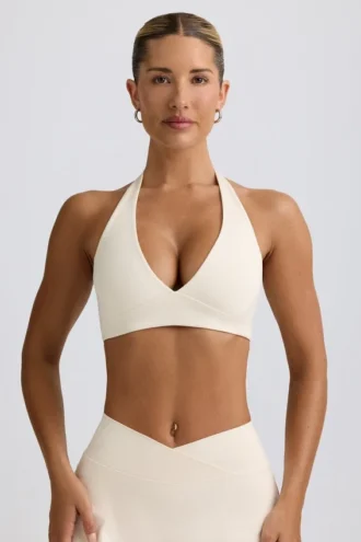 Sutien sport din jersey periat cu decolteu în V, în culoarea Ivory Marl