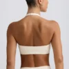 Sutien sport din jersey periat cu decolteu în V, în culoarea Ivory Marl Sutien sport din jersey periat cu decolteu în V, în culoarea Ivory Marl