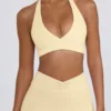 Sutien sport din jersey periat cu decolteu în V, în nuanța Lemon Marl Sutien sport din jersey periat cu decolteu în V, în nuanța Lemon Marl