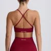 Sutien sport fără cusături, cu spate încrucișat, Super Sculpt, în culoarea burgund Sutien sport fără cusături, cu spate încrucișat, Super Sculpt, în culoarea burgund