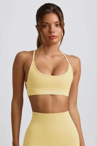 Sutien sport fără cusături și fără spate Super Sculpt, în culoarea Butter Yellow