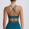 Sutien sport fără cusături Super Sculpt cu bretele încrucișate pe spate, culoare verde-albăstrui Sutien sport fără cusături Super Sculpt cu bretele încrucișate pe spate, culoare verde-albăstrui