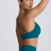 Sutien sport fără cusături Super Sculpt cu bretele încrucișate pe spate, culoare verde-albăstrui Sutien sport fără cusături Super Sculpt cu bretele încrucișate pe spate, culoare verde-albăstrui