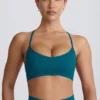 Sutien sport fără cusături Super Sculpt cu bretele încrucișate pe spate, culoare verde-albăstrui Sutien sport fără cusături Super Sculpt cu bretele încrucișate pe spate, culoare verde-albăstrui