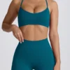 Sutien sport fără cusături Super Sculpt cu bretele încrucișate pe spate, culoare verde-albăstrui Sutien sport fără cusături Super Sculpt cu bretele încrucișate pe spate, culoare verde-albăstrui