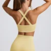 Sutien sport fără cusături Super Sculpt cu bretele încrucișate pe spate, în culoarea galben unt Sutien sport fără cusături Super Sculpt cu bretele încrucișate pe spate, în culoarea galben unt