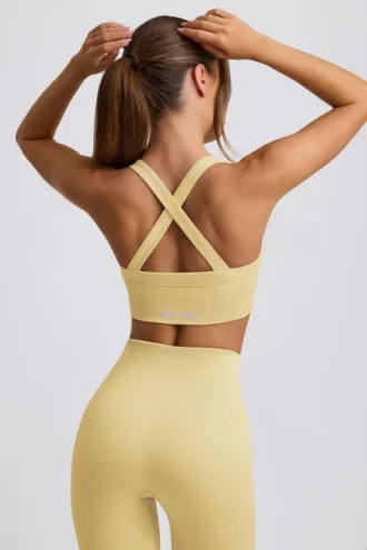 Sutien sport fără cusături Super Sculpt cu bretele încrucișate pe spate, în culoarea galben unt