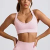 Sutien sport fără cusături Super Sculpt cu bretele încrucișate pe spate, în culoarea roz pudră Sutien sport fără cusături Super Sculpt cu bretele încrucișate pe spate, în culoarea roz pudră