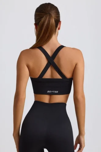 Sutien sport fără cusături Super Sculpt cu bretele încrucișate pe spate, negru