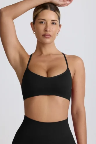 Sutien sport fără cusături Super Sculpt cu spate încrucișat, negru