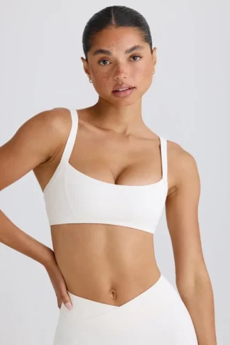 Sutien sport Soft Active cu bordură contrastantă, alb
