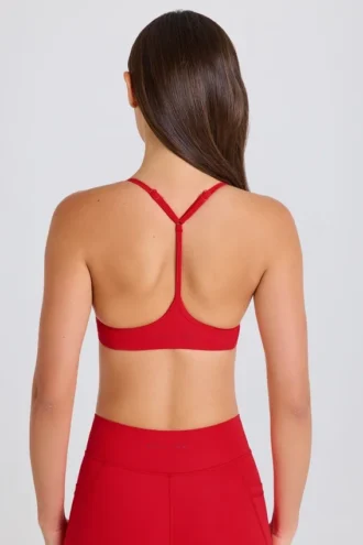 Sutien sport Soft Active cu bretele încrucișate la spate, în culoarea roșu căpșună