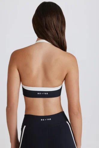 Sutien sport Soft Active cu decolteu în V și partea din față răsucită, în culoarea negru