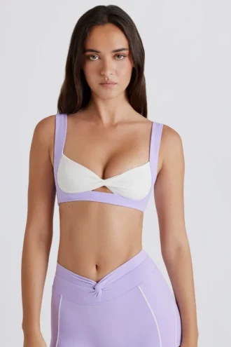 Sutien sport Soft Active cu detaliu răsucit în față, în culoarea liliac