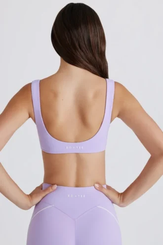 Sutien sport Soft Active cu detaliu răsucit în față, în culoarea liliac