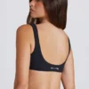 Sutien sport Soft Active cu partea din față răsucită, negru