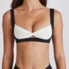 Sutien sport Soft Active cu partea din față răsucită, negru