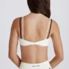 Sutien sport Soft Active cu spate răsucit, în nuanța Ivory Sutien sport Soft Active cu spate răsucit, în nuanța Ivory