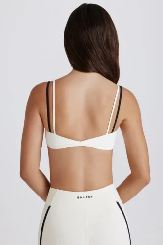 Sutien sport Soft Active cu spate răsucit, în nuanța Ivory