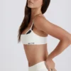Sutien sport Soft Active cu spate răsucit, în nuanța Ivory Sutien sport Soft Active cu spate răsucit, în nuanța Ivory