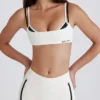 Sutien sport Soft Active cu spate răsucit, în nuanța Ivory Sutien sport Soft Active cu spate răsucit, în nuanța Ivory