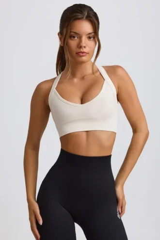 Sutien sport Super Sculpt fără cusături, cu bretele încrucișate la spate, în culoarea alb