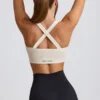 Sutien sport Super Sculpt fără cusături, cu bretele încrucișate la spate, în culoarea alb Sutien sport Super Sculpt fără cusături, cu bretele încrucișate la spate, în culoarea alb