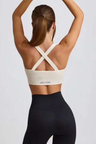 Sutien sport Super Sculpt fără cusături, cu bretele încrucișate la spate, în culoarea alb