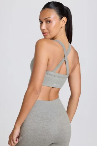 Sutien sport Super Sculpt fără cusături, cu bretele încrucișate la spate, în culoarea gri melanj