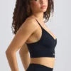 Sutien sport Super Sculpt fără cusături, cu decolteu rotund, în negru Sutien sport Super Sculpt fără cusături, cu decolteu rotund, în negru