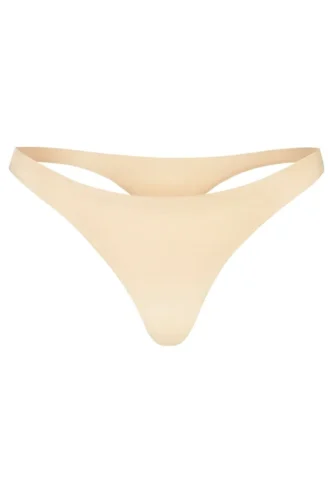 Tanga din tricot fără cusături Intimates în culoarea piersică caldă Tanga din tricot fără cusături Intimates în culoarea piersică caldă