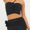 Tesia Top asimetric din jersey elastic cu detalii de trandafiri, negru